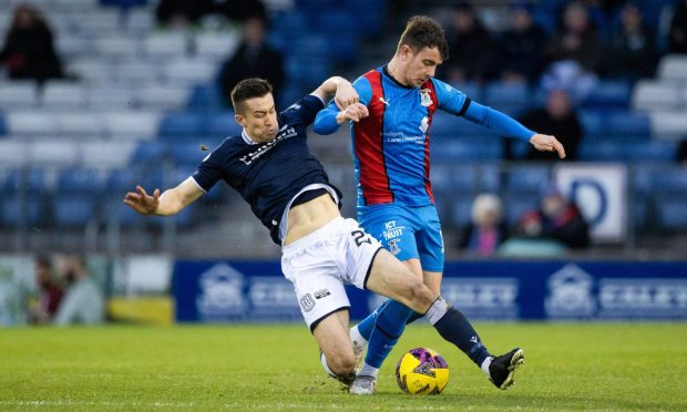 Cammy Kerr, left, in action against ICT's Aaron Doran in December 2022.