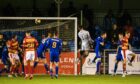 Partick Thistle goalkeeper Jamie Sneddon scores a dramatic late equaliser against Cove Rangers. Image: SNS
