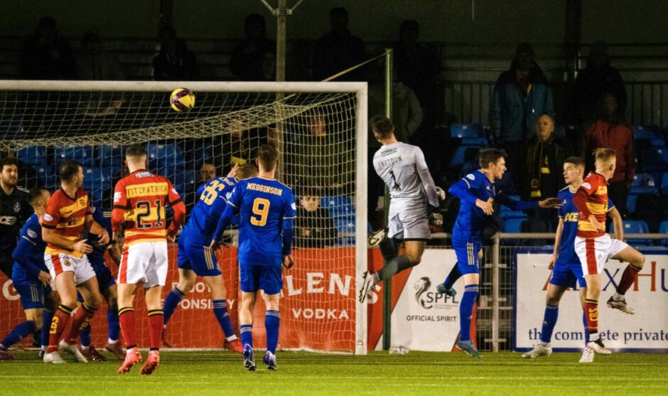 Partick Thistle goalkeeper Jamie Sneddon scores a dramatic late equaliser against Cove Rangers. Image: SNS
