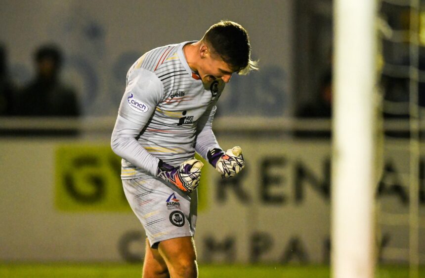 Partick Thistle goalkeeper Jamie Sneddon celebrates his leveller against Cove Rangers. Image: SNS