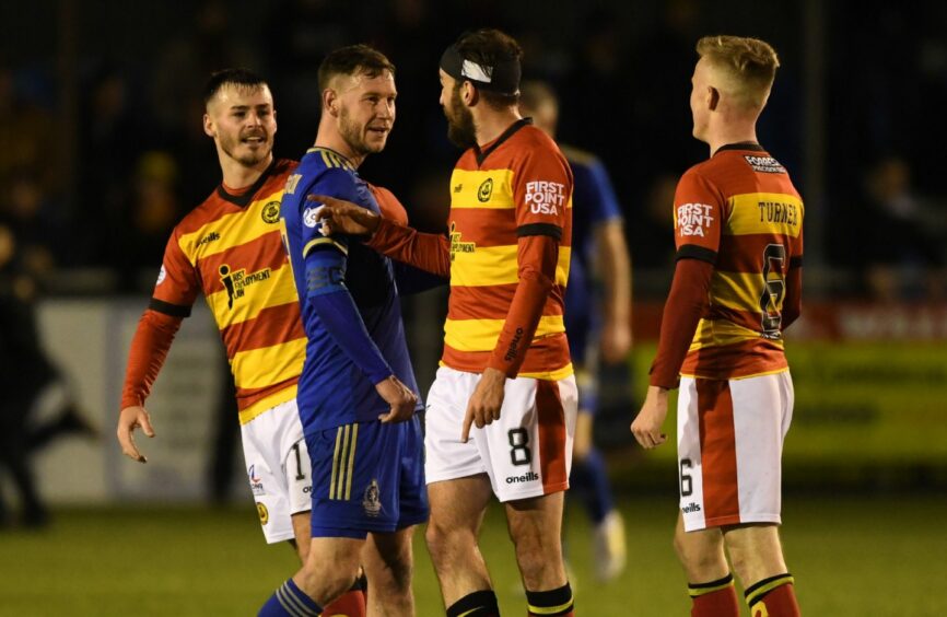 Mitch Megginson and Stuart Bannigan during a cinch Championship match between Cove Rangers and Partick Thistle. Image: SNS