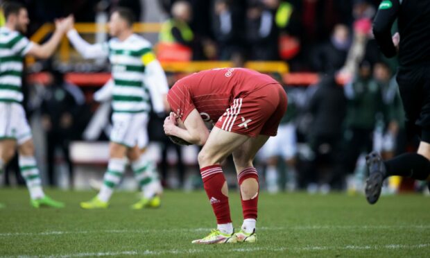Aberdeen defender Jack Mckenzie shows his disappointment. Image: SNS.