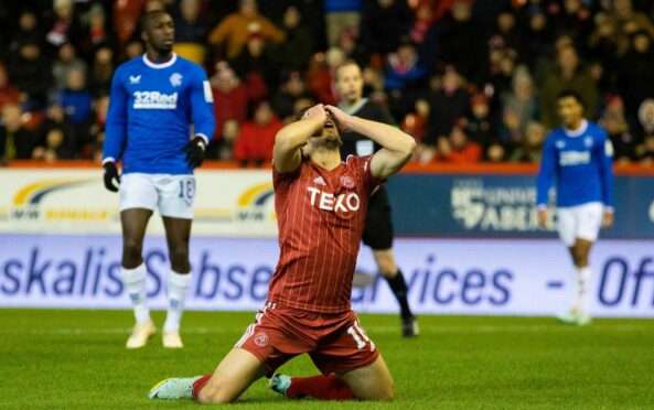 Aberdeen's Ylber Ramadani looks dejected after missing a good chance to level against Rangerss.
(Photo by Craig Williamson / SNS Group)