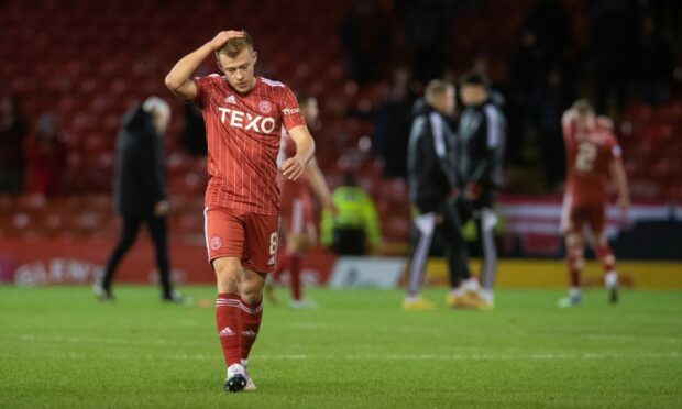 Aberdeen's Connor Barron looks dejected at full time after 3-2 loss to Rangers.(Photo by Craig Foy / SNS Group)