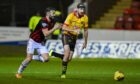 Sean Welsh, left, gives chase to Partick's Stuart Bannigan in Friday's 5-1 defeat at Firhill. Images: Rob Casey/SNS Group