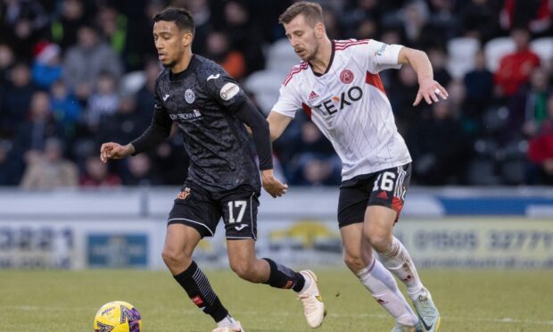 St Mirren's Keanu Baccus (L) and Aberdeen's Ylber Ramadani in action during a Premiership match last season. Image: SNS.