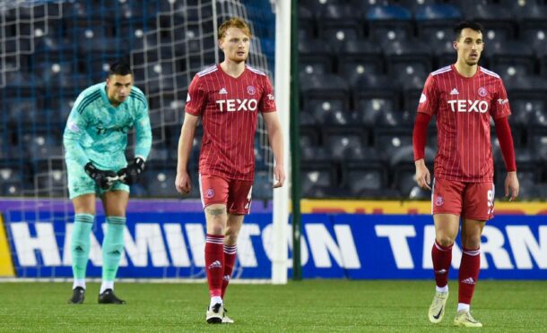 Liam Scales and Bojan Miovski (R) are dejected as Kilmarnock score a second goal to make it 2-0. Image: SNS.