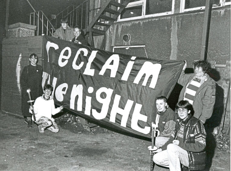 1990 - Reclaim the Night '90 campaigners with a banner ahead of the march on Union Street for women's safety. 