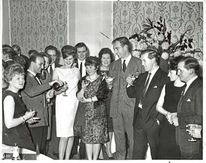 1965 - Guests at the Royal Athenaeum Restaurant attend a cocktail party to celebrate its grand re-opening. 