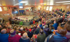 Farmers and the rural community enjoy Christmas activities at Forfar Mart.