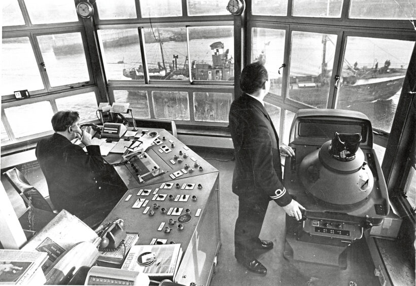 1974 - A demonstration of how the harbour's radar surveillance system works from its control tower. 