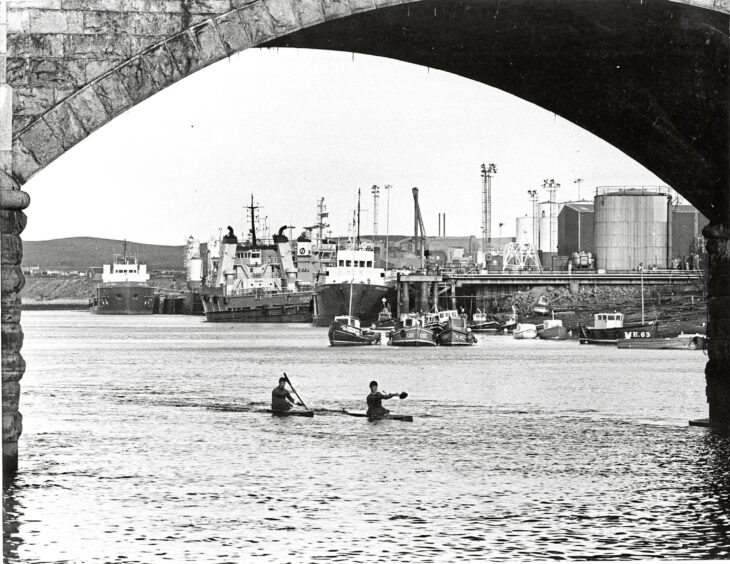 1988 - Deeside Kayak Club members Neil West and Alan Reid put in some training on the River Dee. 