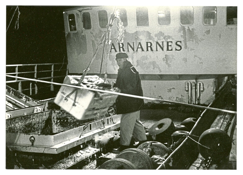 1990 - The Icelandic trawler Arnarnes being unloaded last night at Aberdeen fishmarket.