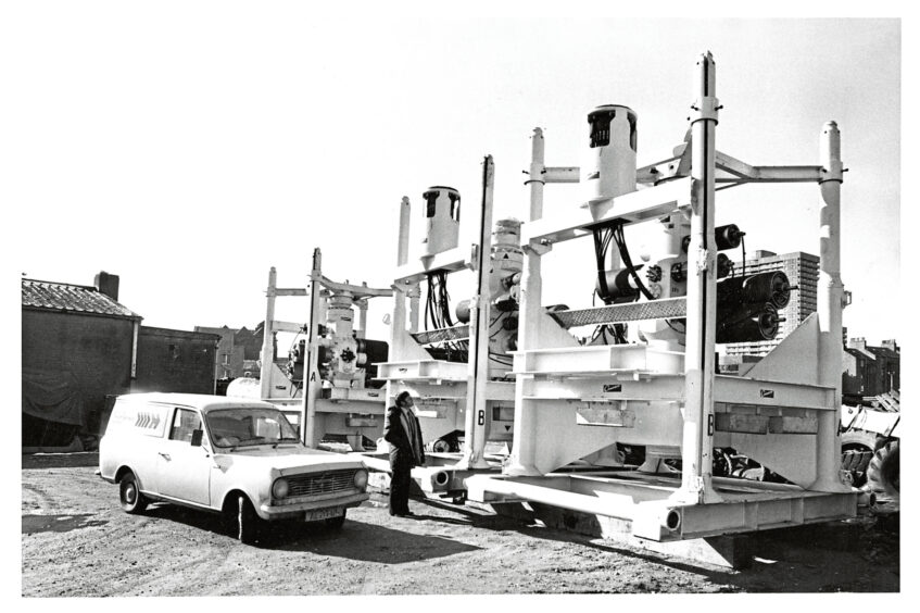 1979 - Three oil production trees ready for shipment offshore by Hudson Freight Service at Waterloo Quay.