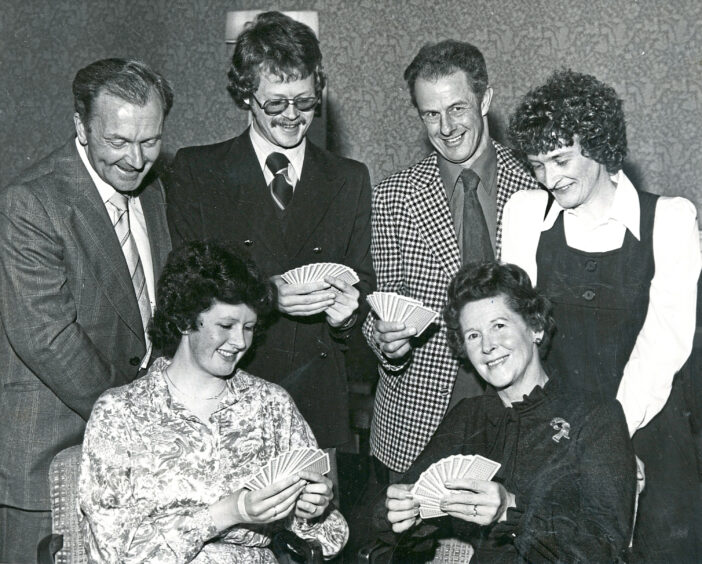 1979 - The Ferguson family from Turriff look at their cards ahead of the Press and Journal Bridge Pairs tournament at the Station Hotel in Aberdeen. 