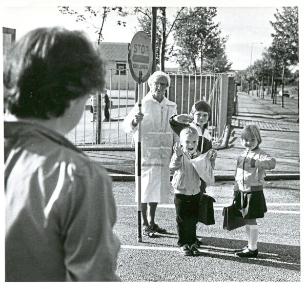 1983 - Marie-Louise McBain, who was going to school for the first time, brother Paul and pal Angie Morrison wave at mum Ray McBain on their way to Fernielea School. 
