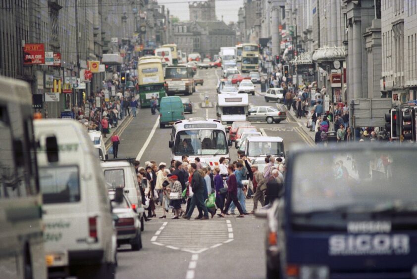 Union Street, Aberdeen, in 1995 - with the golden arches of the city's first McDonald's visible on the left. Image: Simon Price/ DC Thomson