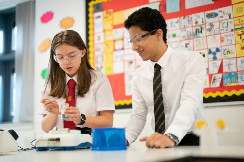 A photo of two students of Albyn in a science lesson