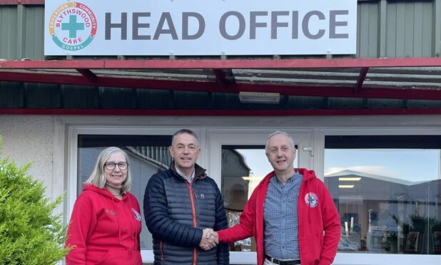 Willie Gray of Ark Estates with Danny Muschate, head of fundraising at Blythswood Care and Elma Mackay, fundraising manager for the north of Scotland at Blythswood Care. Image: Blythswood Care.