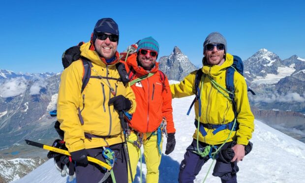 James Ellerton (left) and his friend Jonny Little (far right) with their climbing guide in the Alps. Image: James Ellerton