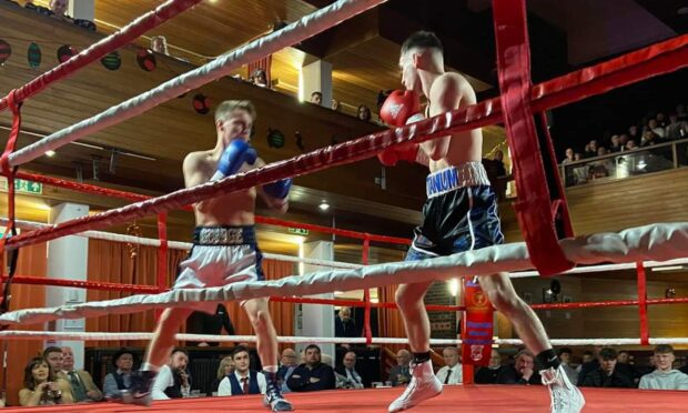 Inverness City boxers George Stewart, left, and Calum Turnbull put on an exhibition bout in Elgin last weekend.  Image: Peter Faber