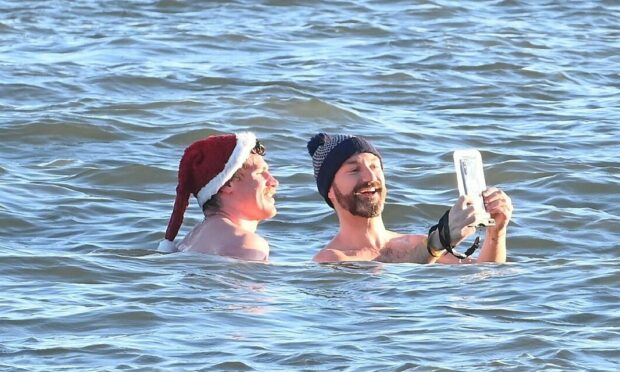 More than 70 people took the plunge in the North Sea. Image: Chris Sumner/DC Thomson