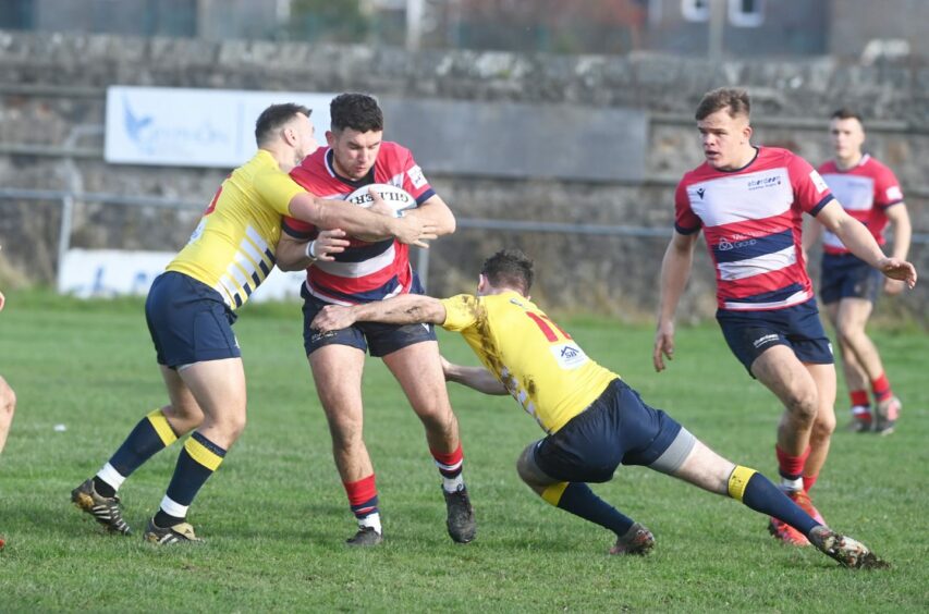 Doug Russell in action for Aberdeen Grammar against Dundee. Image: Chris Sumner/DC Thomson