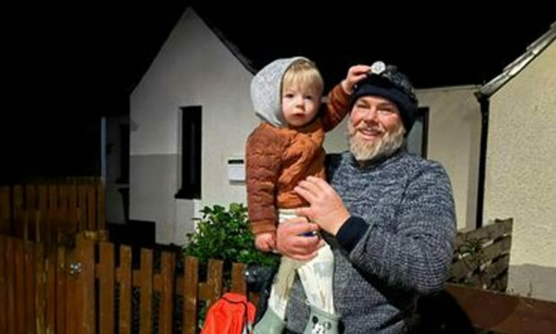 Chris Hutchison from Staffin pictured with is son Ruaraidh. Image: Chris Hutchison.