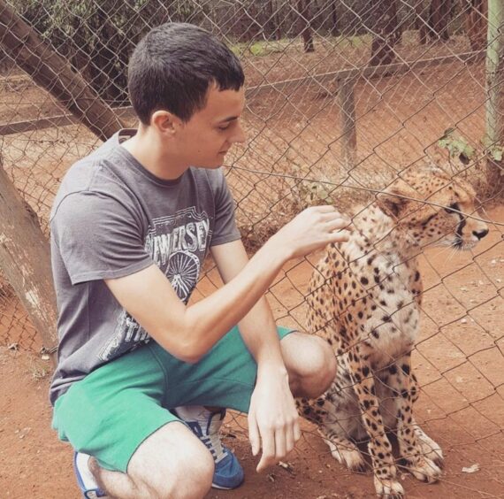 Kyle McRobert with cheetah