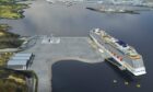 A digital mock-up of how a large cruise ship will look docking at Stornoway's Deep Water Terminal.