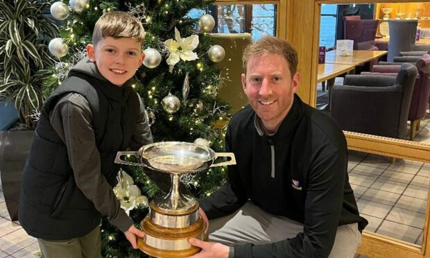 Deeside Golf Club champion David Macklin and son Cammy. Image: Alan Brown