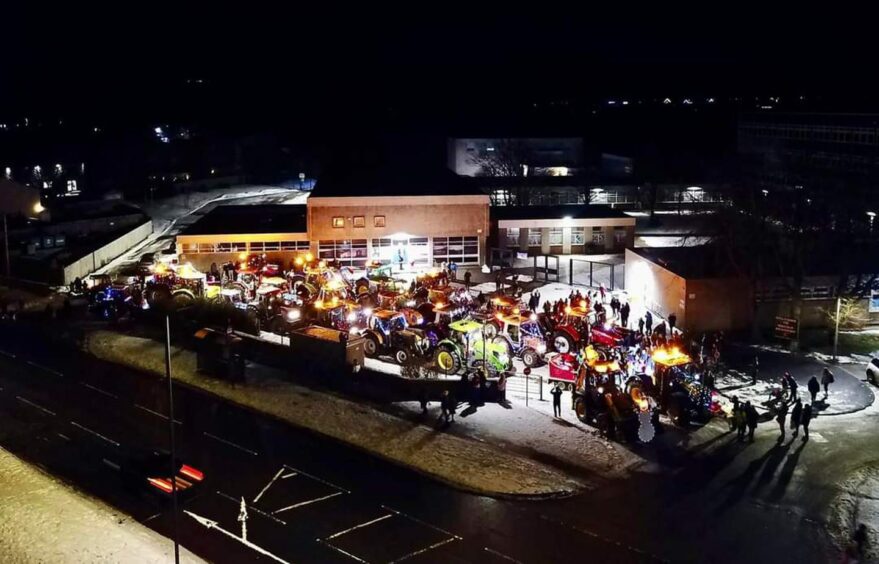 Stonehaven Christmas tractor parade shot from above