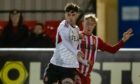 Aberdeen's Kevin Hanratty, left, battles with Jack MacIver of Formartine United
