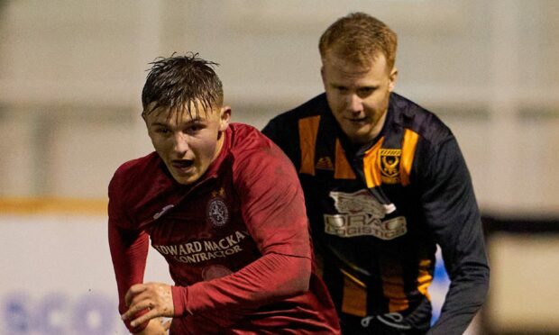 Brora Rangers' James Wallace, left, has suffered a setback after returning from a cruciate ligament injury