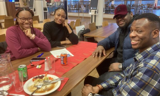 Clara, Glory, Nsan and Moses (from left to right) take part in Aberdeen University's rector's lunch this week along with other overseas students. Image: Andy Morton/DC Thomson.
