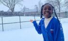 Middleton Park pupil Raihannat Abd-Rahmane sees snow for the first time. Image: Middleton Park Primary School