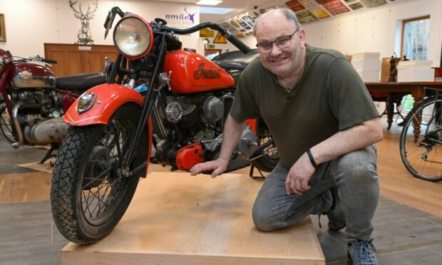 Clive Hampshire, of Oyne charity Smile Scotland, will be auctioning a dozen rare motorbikes later this month. Image: Kenny Elrick/DC Thomson