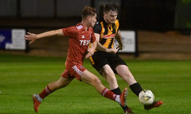 Max Barry, right, in action for Buckie Thistle against Aberdeen