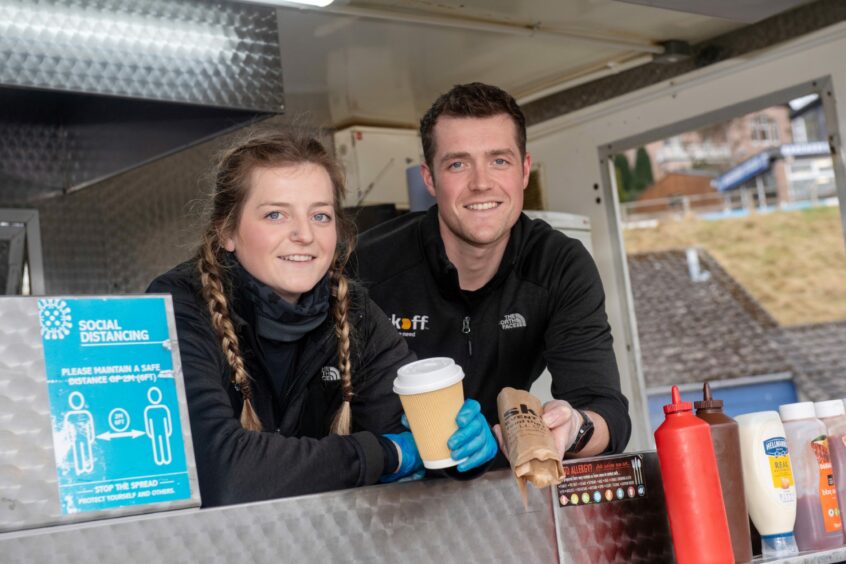 The owners of Scoff in Dyce in their food truck