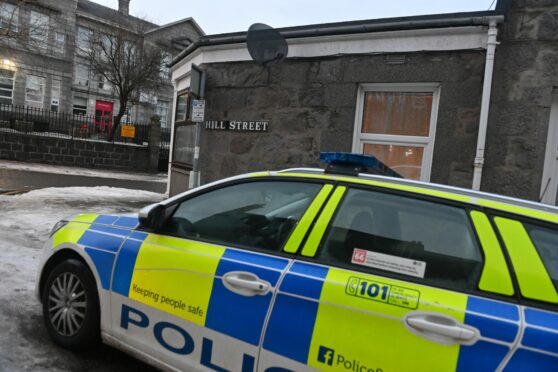 Police going door to door on Hill Street, after an incident happened.  Image: Kath Flannery/DC Thomson.