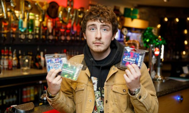 Andy Paterson, with some of the drug testing kits. Image: Kenny Smith/DC Thomson