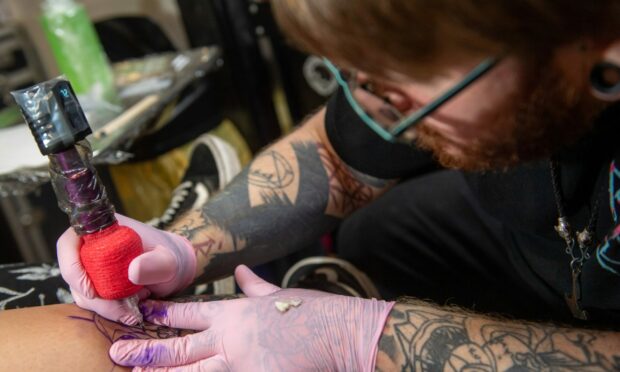 Tattoo artist Russell Arthur got involved in the fundraiser. Image: Kami Thomson / DC Thomson.