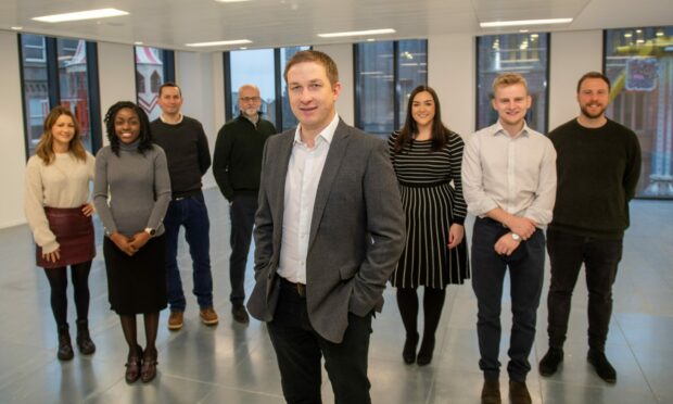 Derren McRae, centre, and some of his CBRE Aberdeen team pay a visit to 1MSq. Image: Kami Thomson/DC Thomson