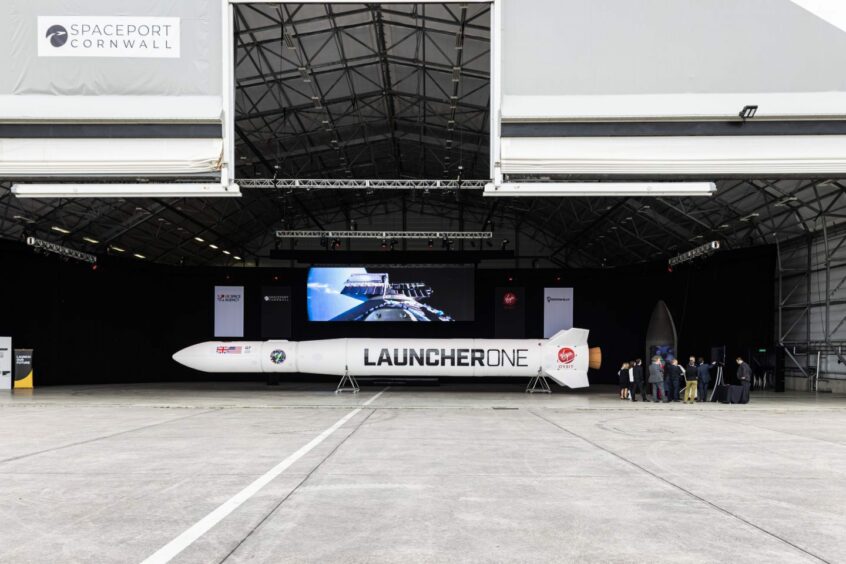 Launcher One orbital launch vehicle in hangar