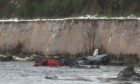 A 19-year-old has died after two cars plunged into the River Dee, on the outskirts of Aboyne, this morning.
Image: Derek Ironside/Newsline Media