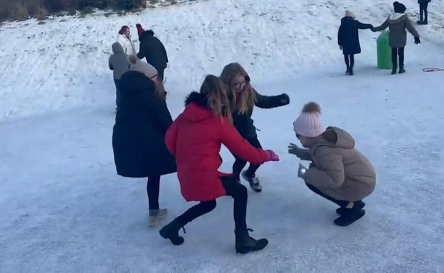 Pupils from Newton Park Primary School in Wick dancing in the snow