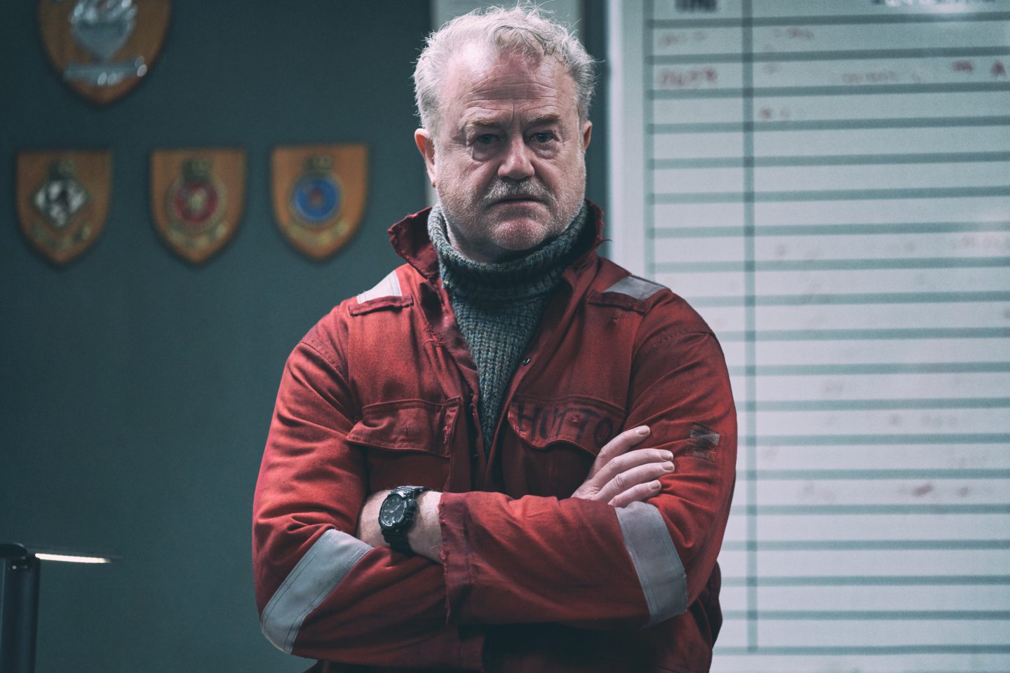 Owen Teale as Lars Hutton, with his arms crossed in a still from Amazon Prime's The Rig