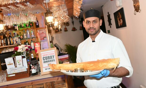 Jinson Paul with a Masal Dosas. Image: Paul Glendell/DC Thomson.