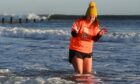 Taking the plunge: Donna Deans warms up ahead of the Boxing Day Nippy Dip. Picture by Paul Glendell / DC Thomson.