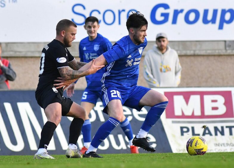 Mikey Hewitt in action for Peterhead. Image: Duncan Brown